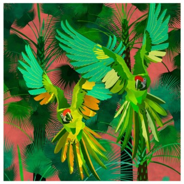 pair of great green macaw birds in flight, both in vivid green with a tropical palm background