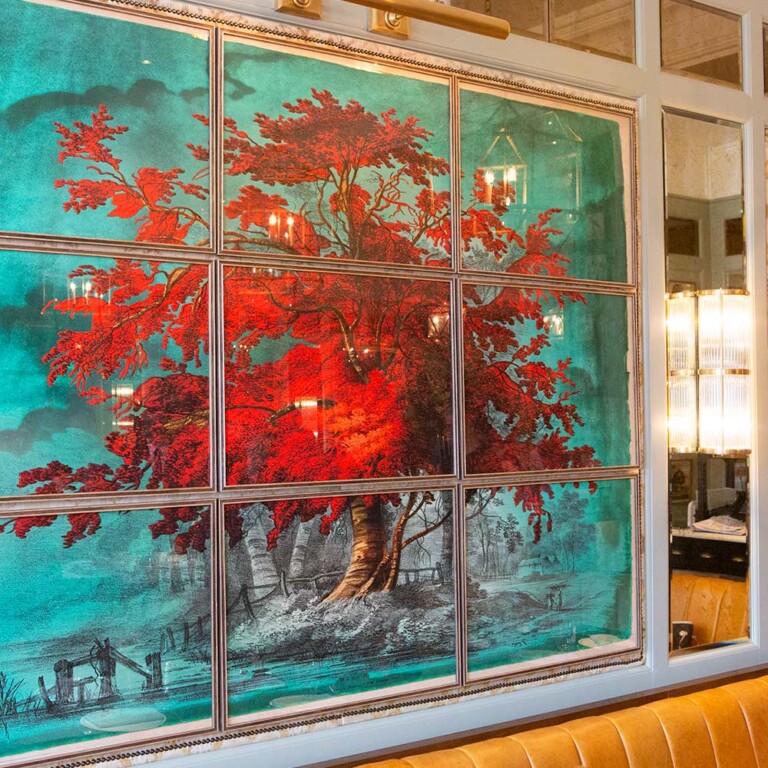 Birch Teal tree edition split across 9 frames within restaurant panelling