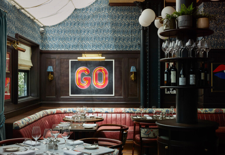 GO print hanging in a restaurant interior